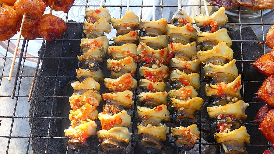 Gegrillte Schnecken - Kambodscha - Essen und Schlafen