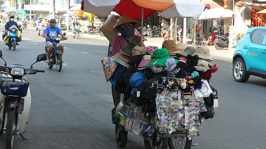 Mütze vergessen - kein Problem :-) - Mekong-Delta - Land und Leute